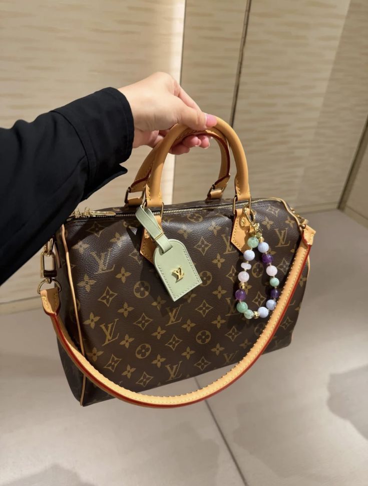 Speedy p9 25 mit Schulterriemen Brown